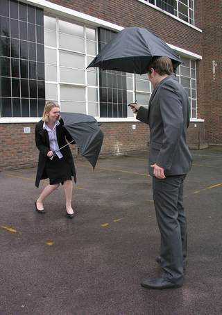 Illustration for article titled Water Pistol Umbrella Makes the Rain a Hell of a Lot More Fun